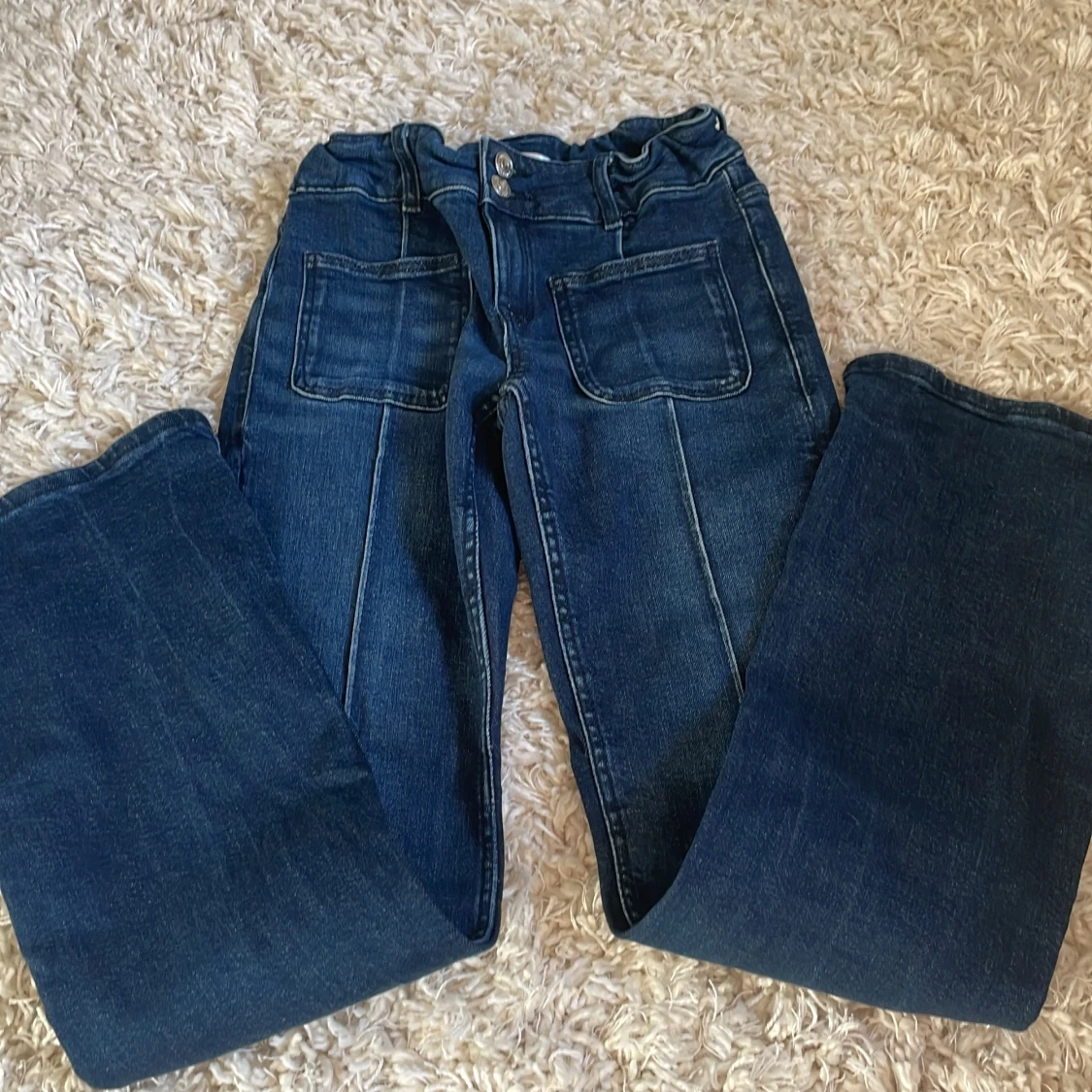 Blå bootcut jeans från Gina Tricot - 1