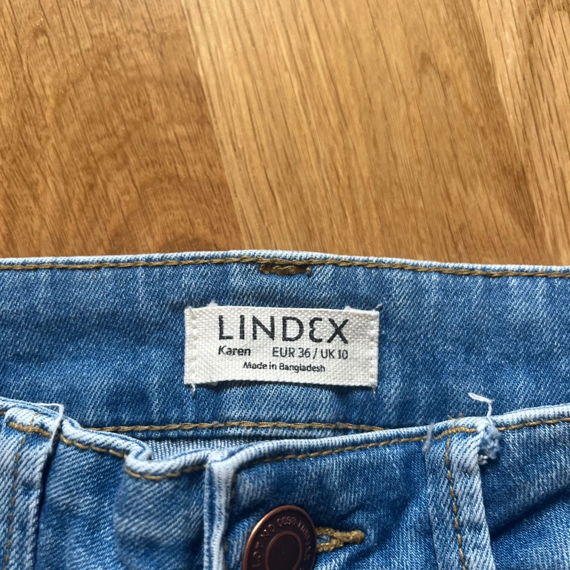 Blå bootcut jeans från Lindex - 4