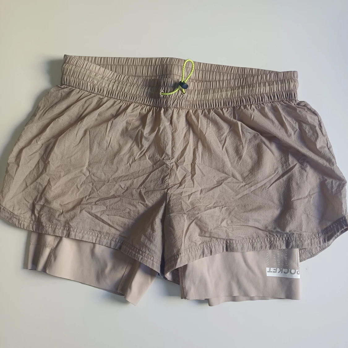 Beige träningsshorts L