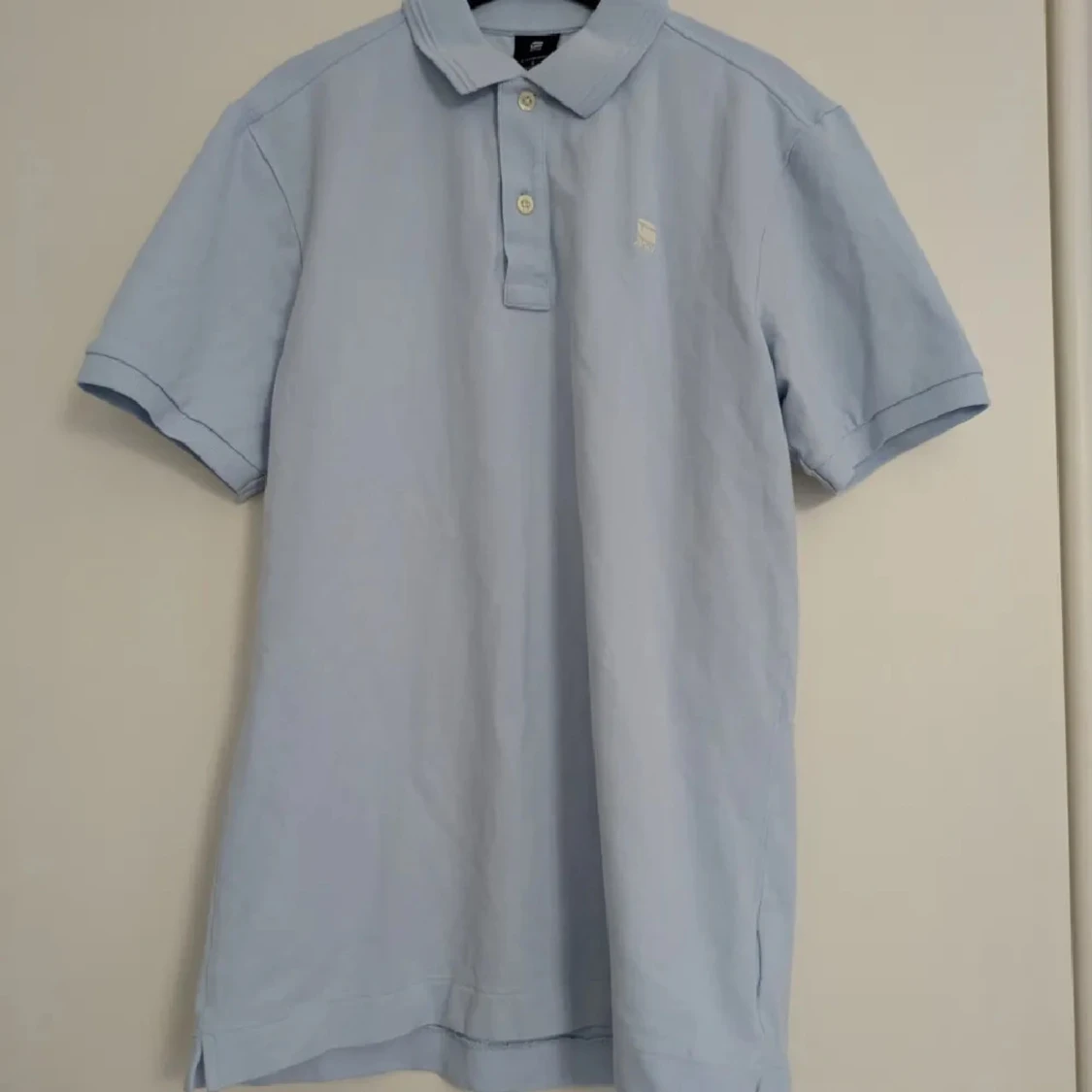 Ljusblå pikétröja från G-Star RAW