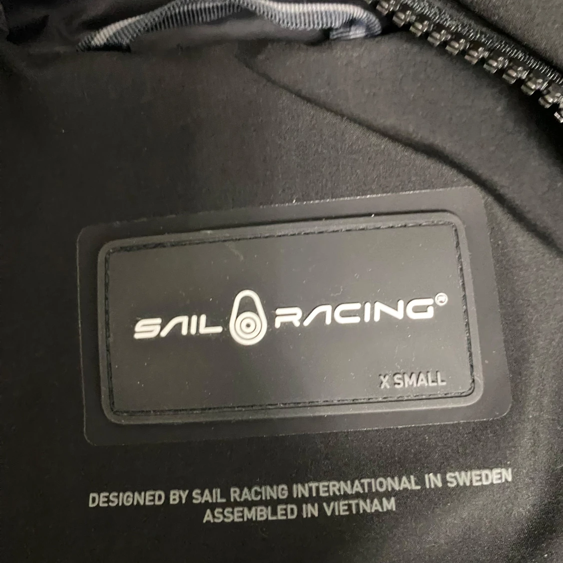 Svart pufferjacka från Sail Racing XS - 1