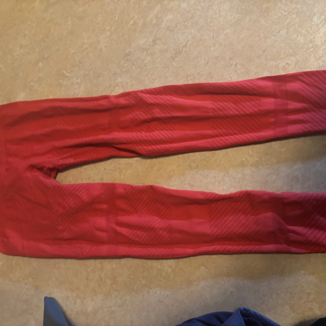 Röda träningstights från Casall