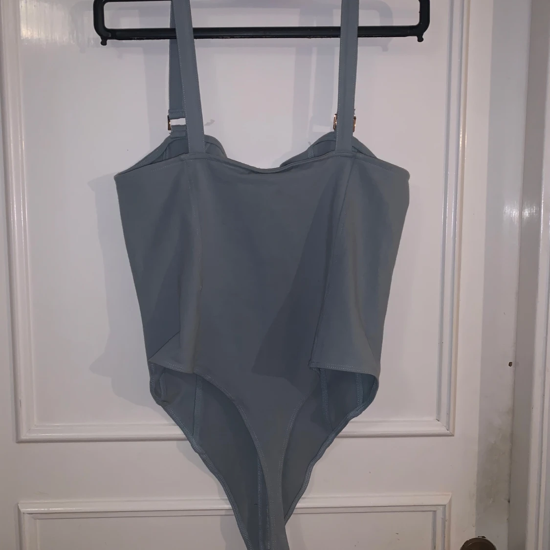 Ljusblå body från H&M - 1