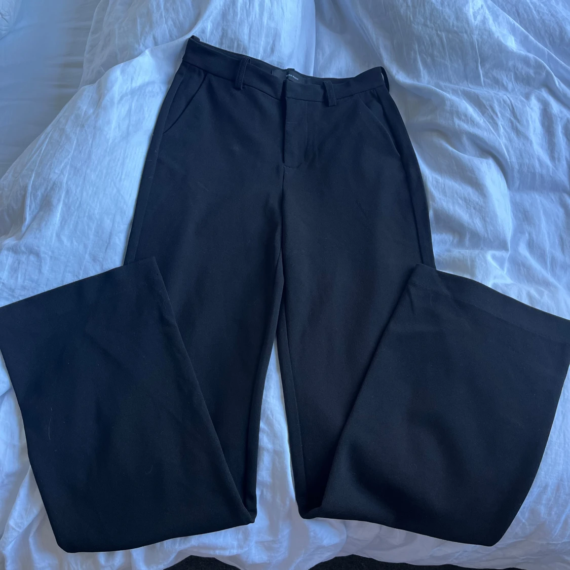 Svarta kostymbyxor med raka ben