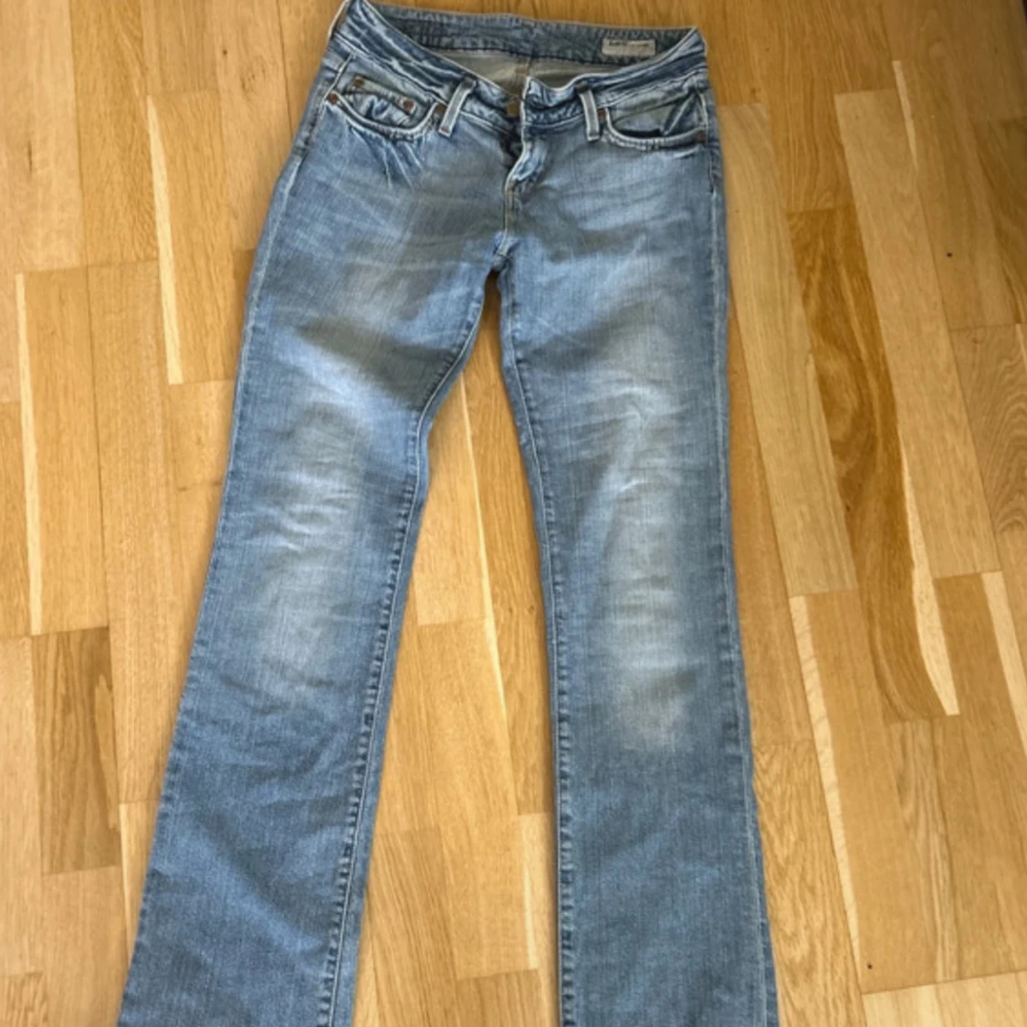 Ljusblå bootcut vintage jeans från Lee