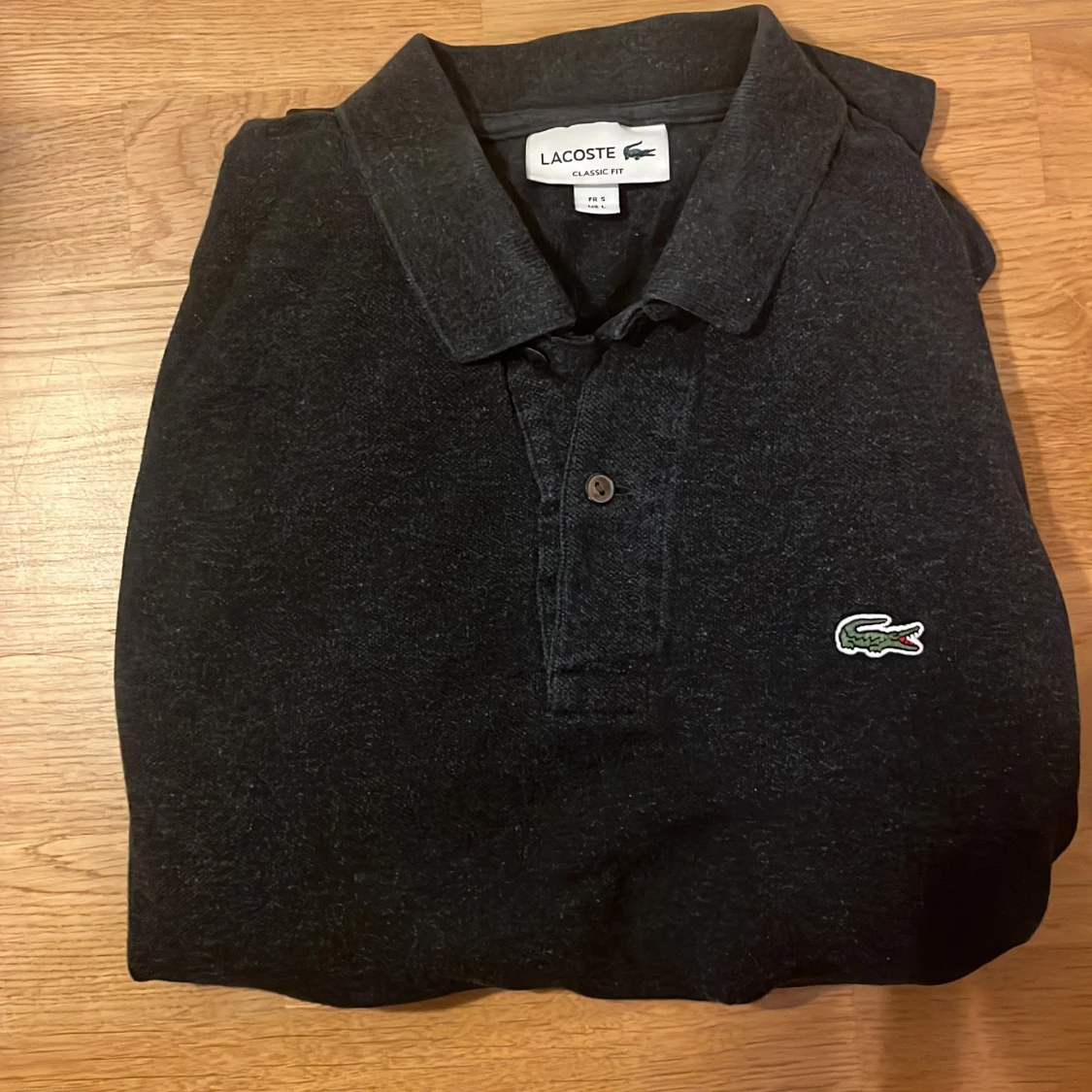 Svart långärmad pikétröja Lacoste