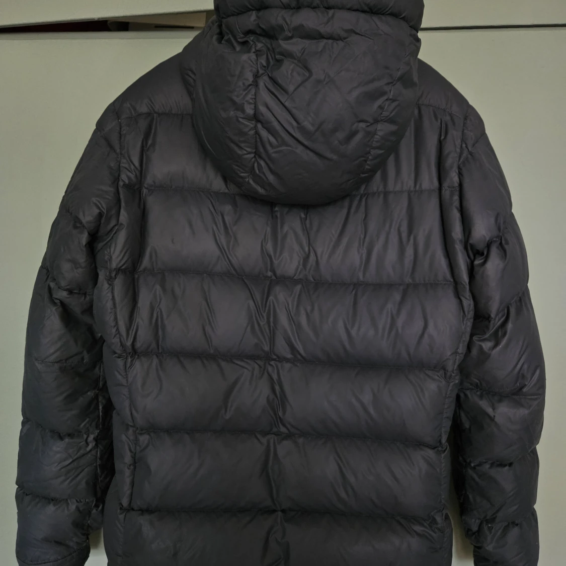 Svart dunjacka Peak Performance S - 1