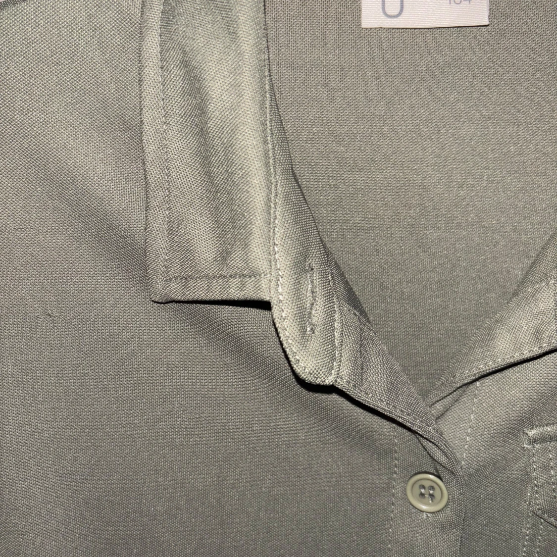 Olivgrön jumpsuit med knappar