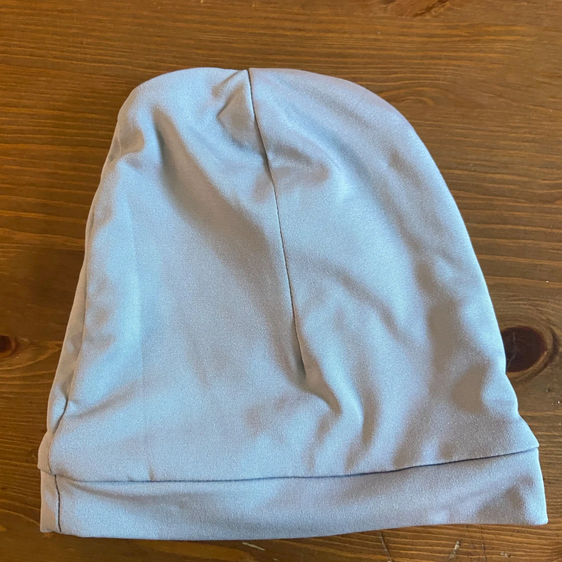 Ljusblå syna world mössa  - 2