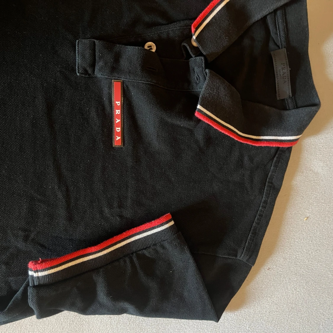 Svart pikétröja från Prada - 1