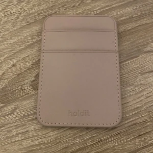 Korthållare holdit - Funkar att klistra fast på mobilskalet, oanvänd.