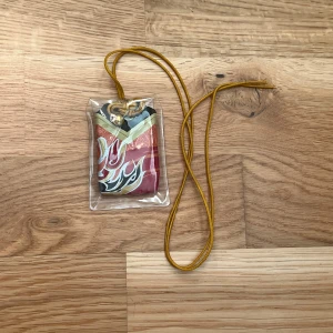 Genshin impact Thoma’s omamori - Thoma’s omamori, in perfect condition and never used c: