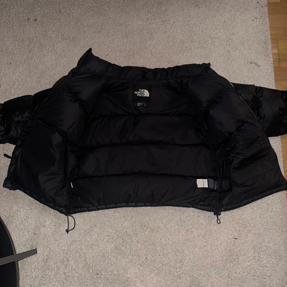 Svart dunjacka från The North Face - 91