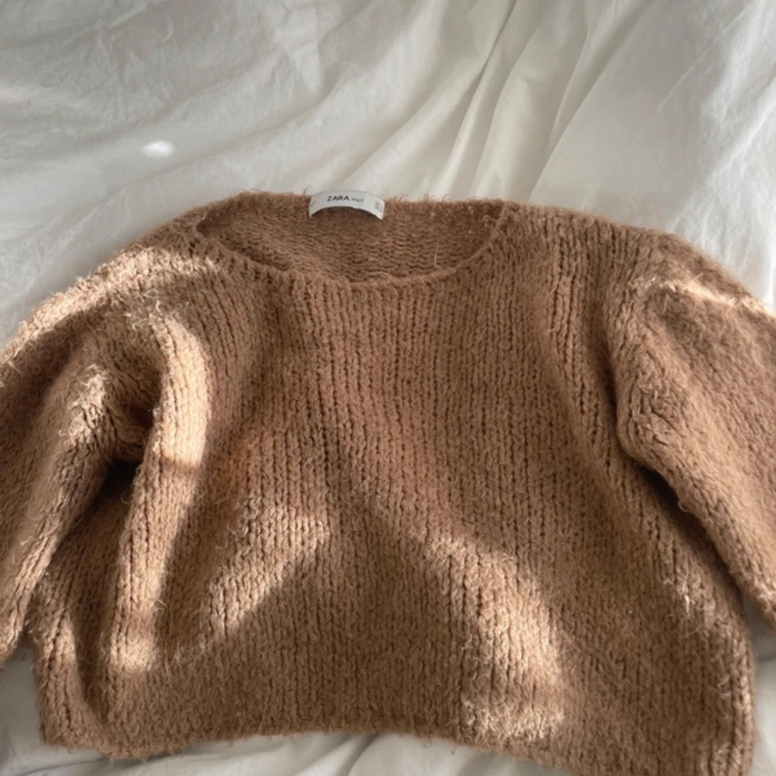 Beige stickad tröja 