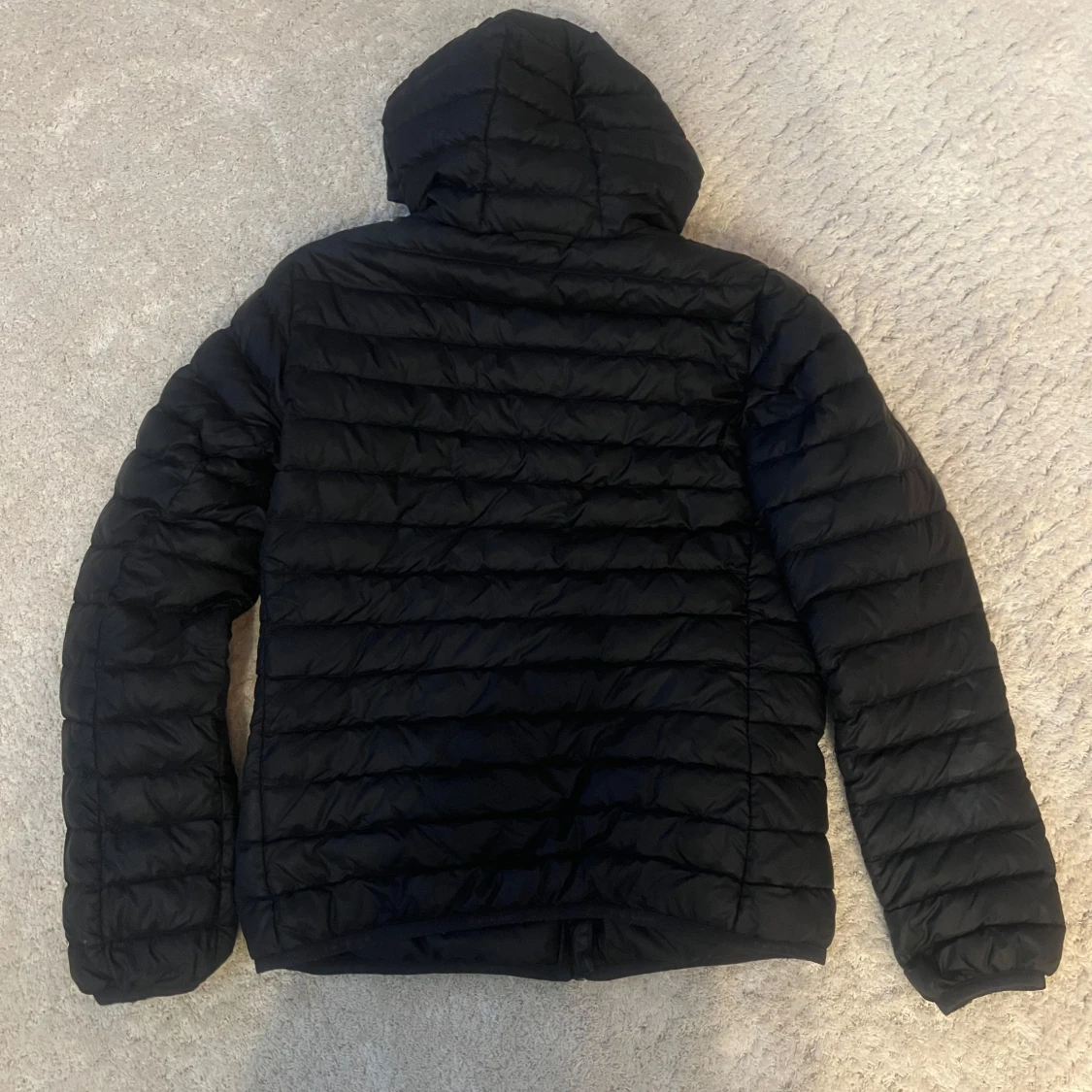 Svart pufferjacka från Peak Performance - 91