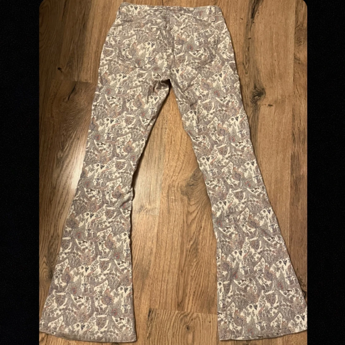 Mönstrade bootcut byxor - 92