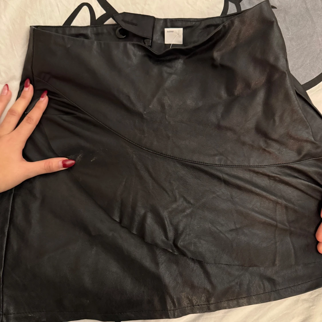 Svart skinnkjol - 90