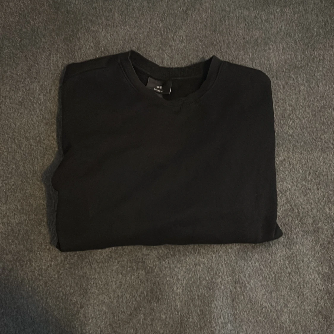 Svart långtröja