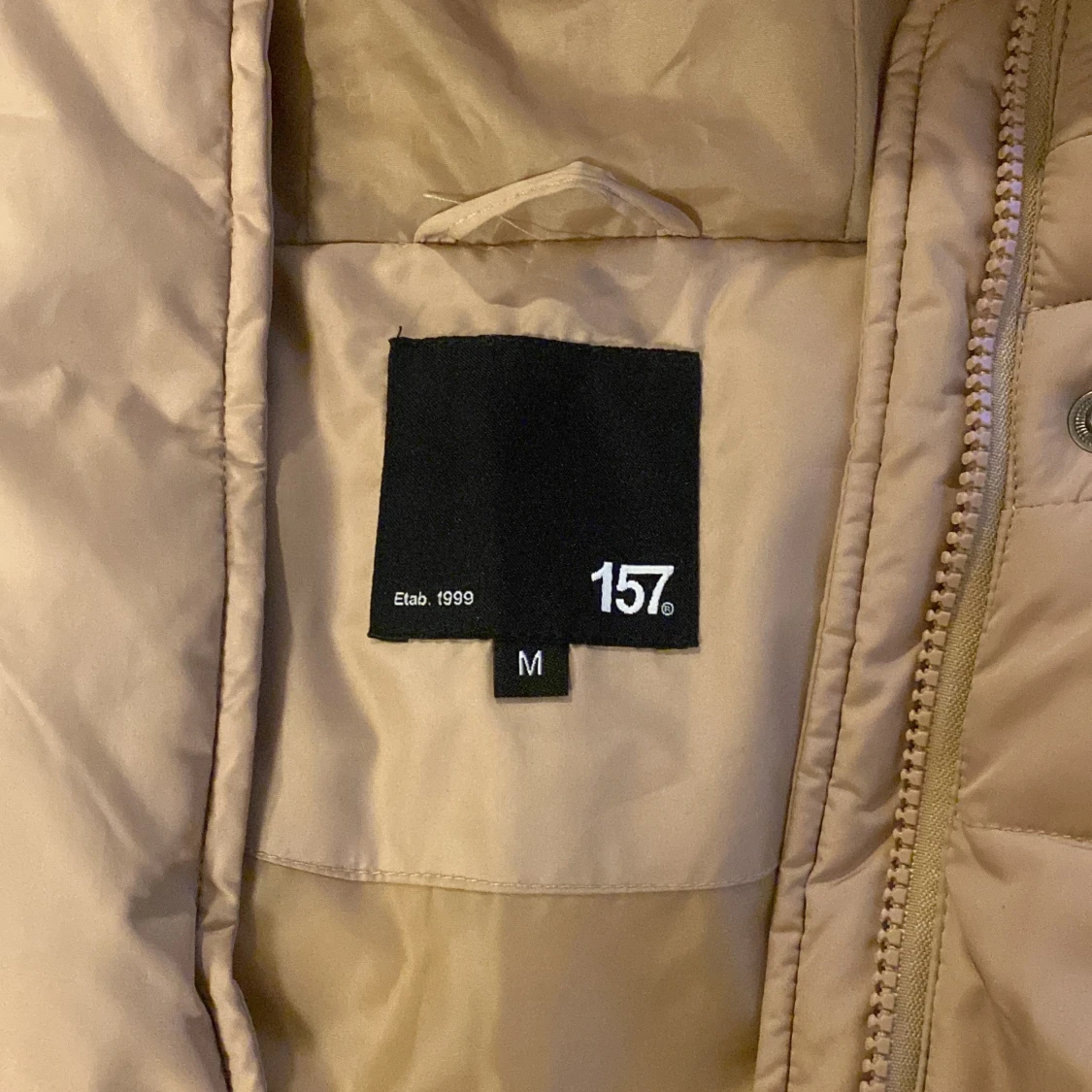 Beige dunjacka från 157 - 91