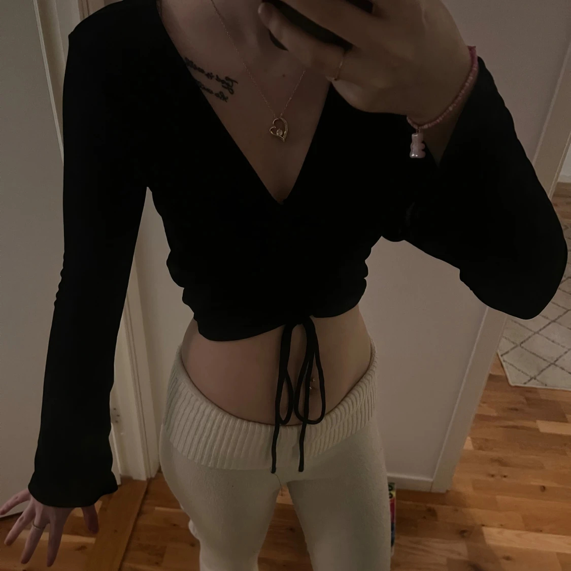 Svart omlottopp från Gina Tricot