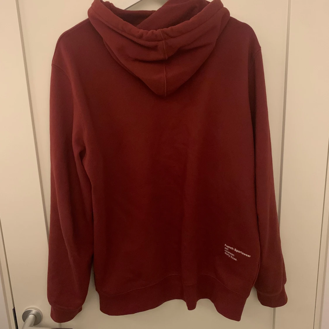Vinröd hoodie från Lacoste - 90