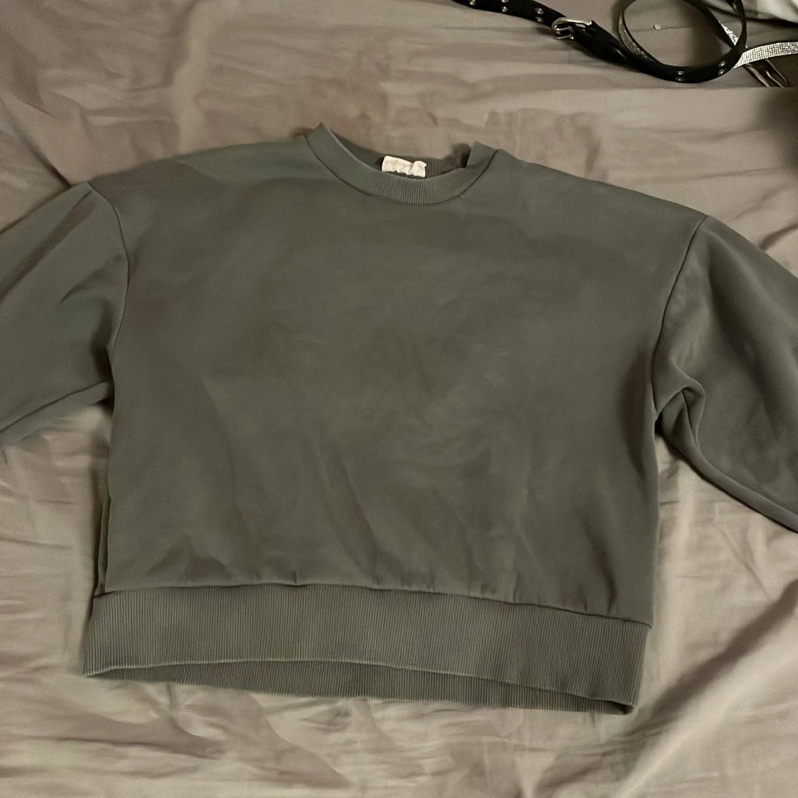 Mörkgrön tjocktröja