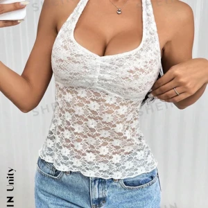 Jättesnygg topp från SHEIN - Jättesnygg topp från Shein, öppen i ryggen, ( skriv för fler bilder) helt oanvänd!