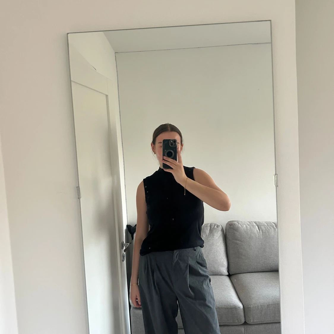 Ärmlös halvpolo tröja