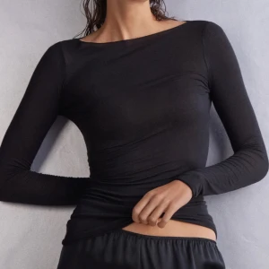 En svart intimissmi  - Storlek Xs passar S med 