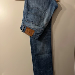 RL Denim & Supply jeans - Säljer ett par jeans från Ralph Lauren Denim & Supply, storlek 30/34. Passar mer som ett par regular fit men något slimmare.