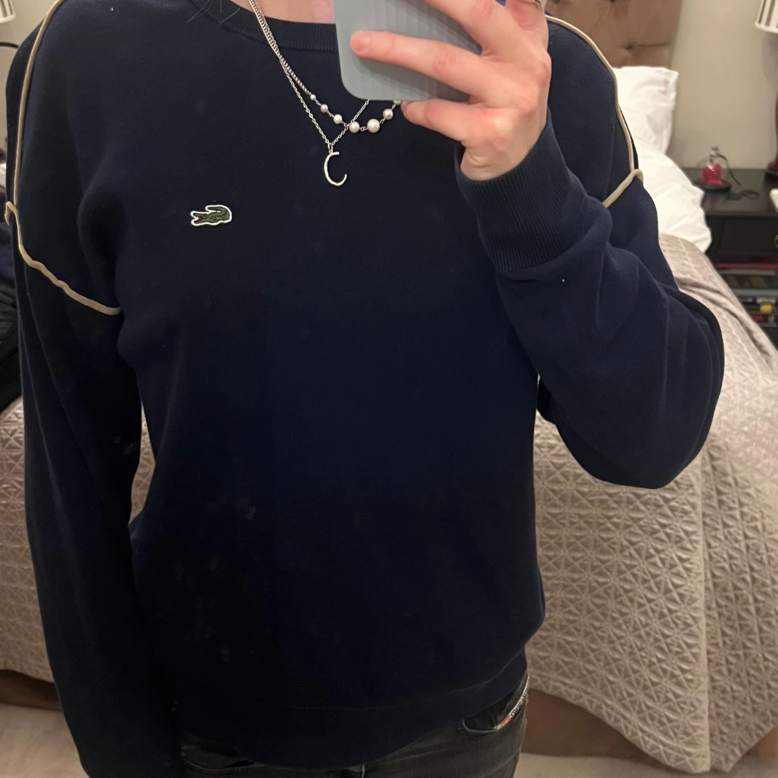 Mörkblå tröja från Lacoste