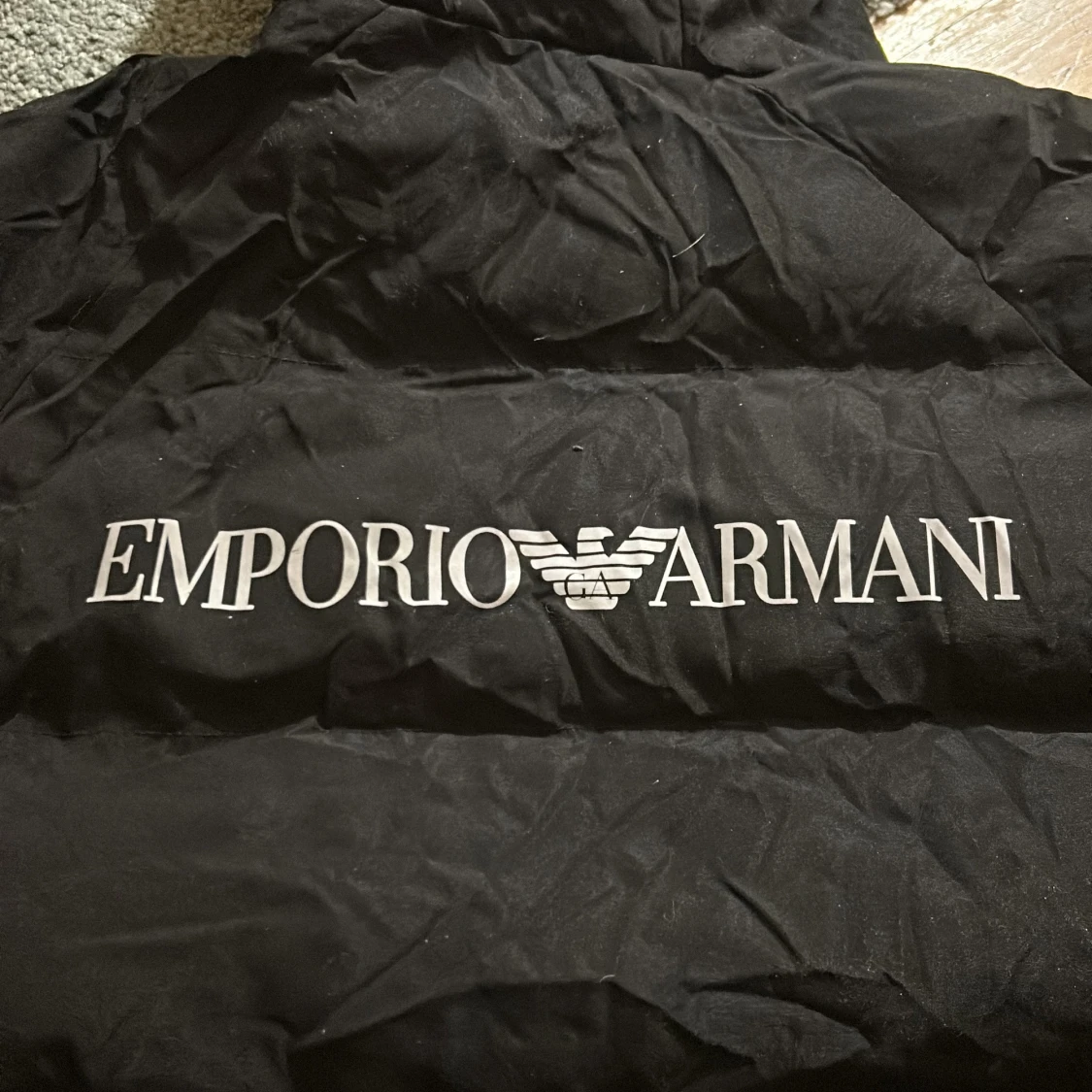 Svart dunjacka från Emporio Armani - 92
