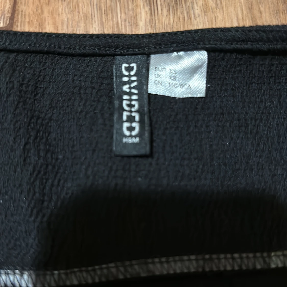 Svart klänning från Divided - 92