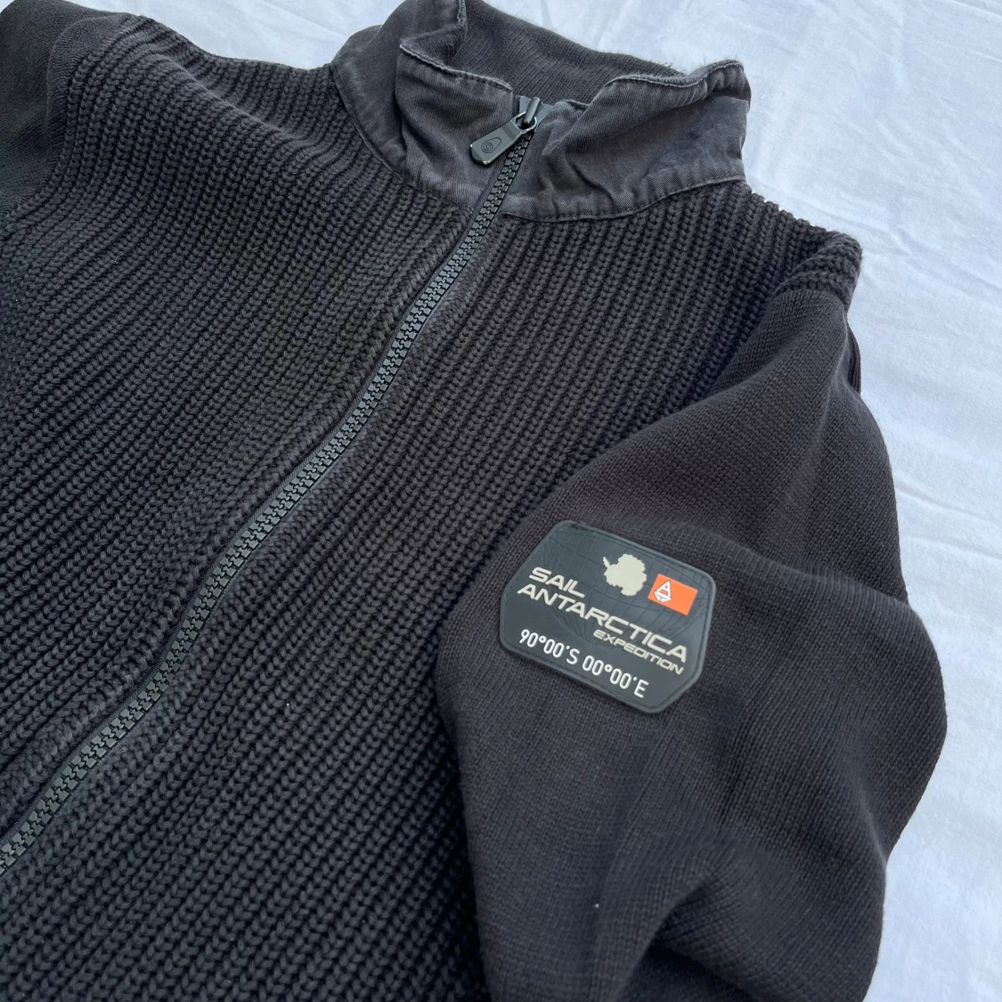 Sail Racing knitted zip jacket svart 