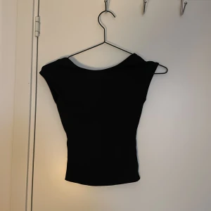 Rygglös tröja - Nyskick aldrig använt  Storlek : XXS