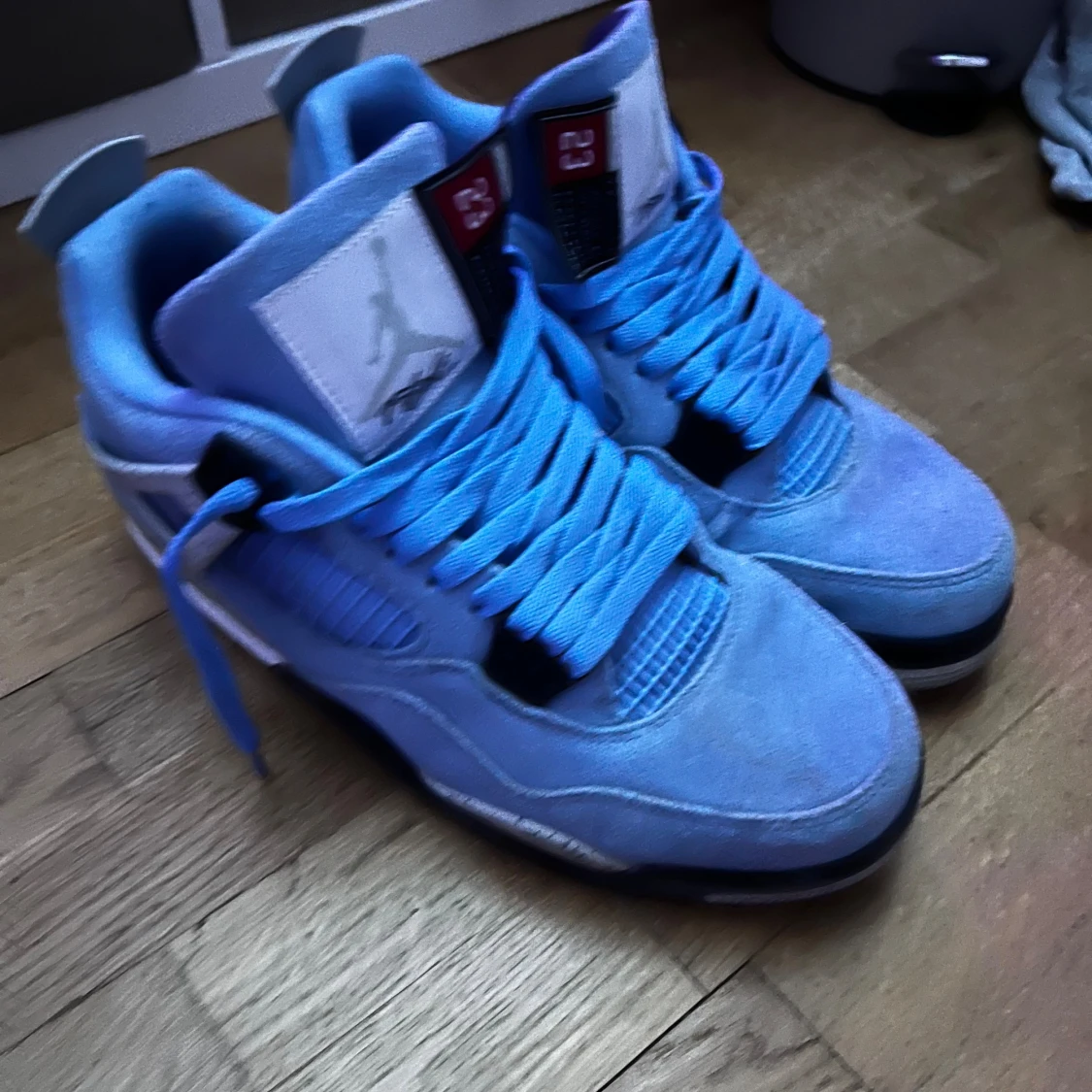 Jordan 4 University Blue  - 91