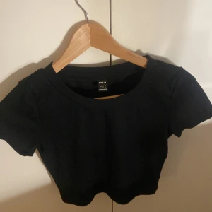 Svart T-Shirt - Bra skick, använd få gånger.