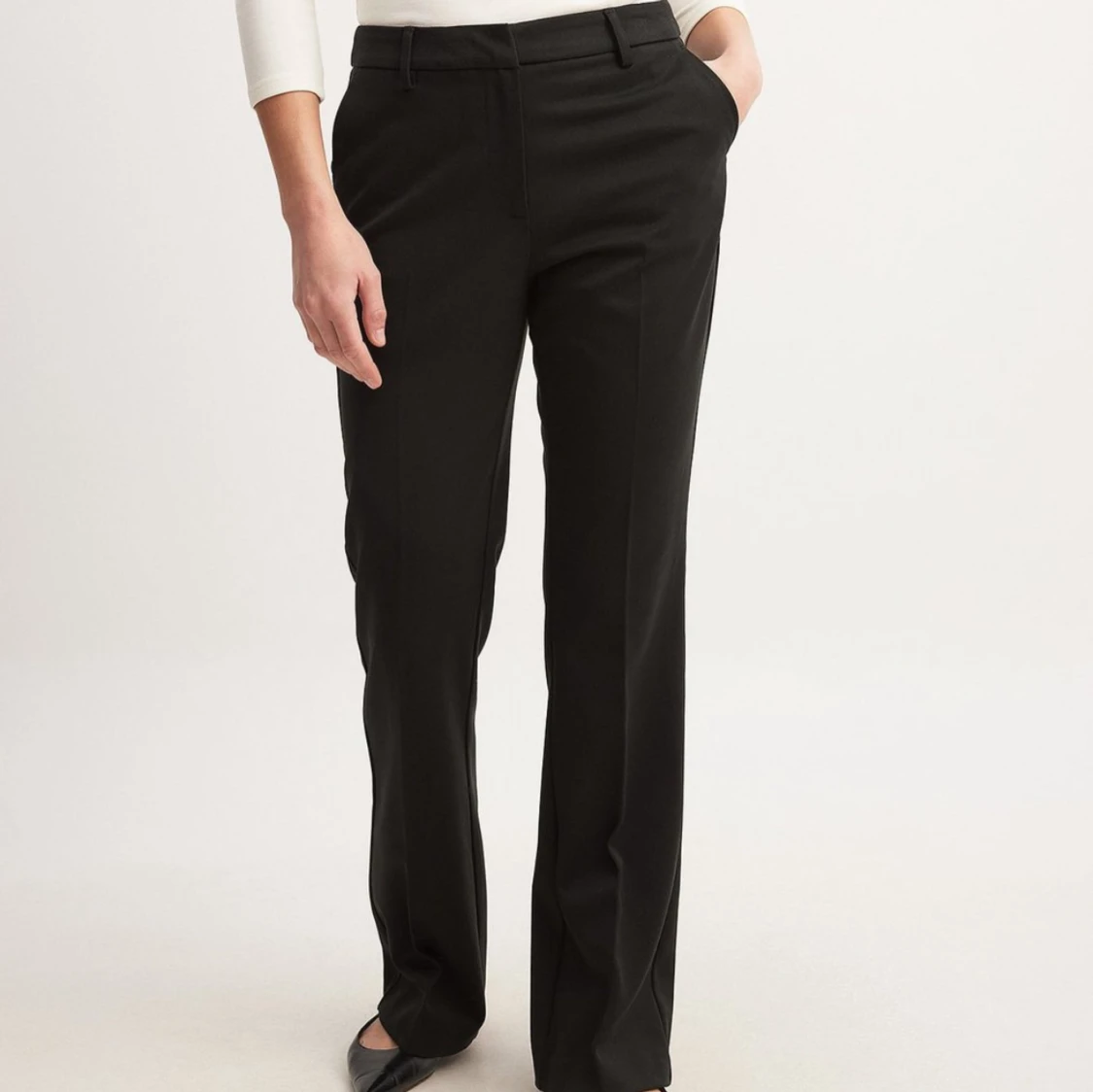 Svarta kostymbyxor