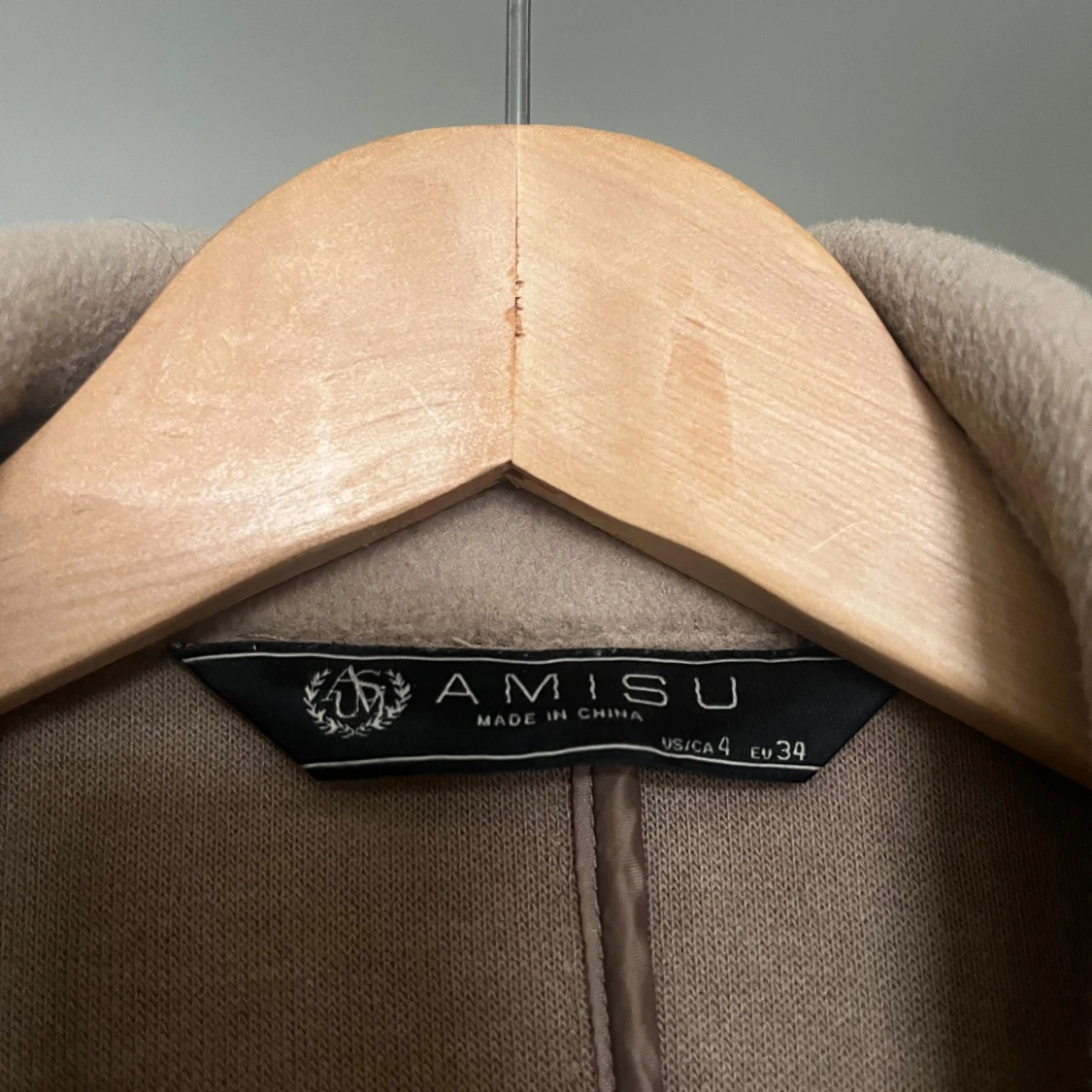 Beige kappa från Amisu - 2