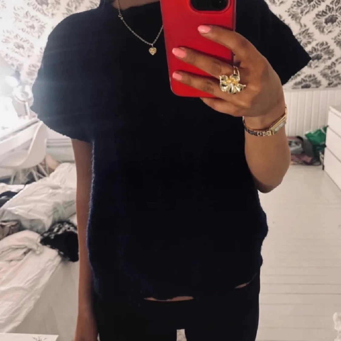 Stickad kortärmad tröja