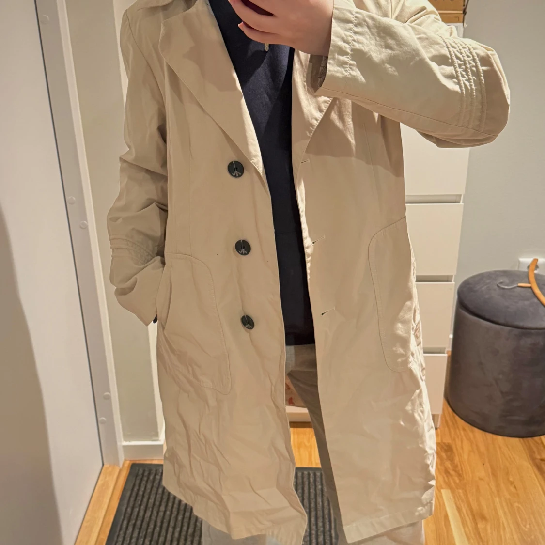 Beige trenchcoat