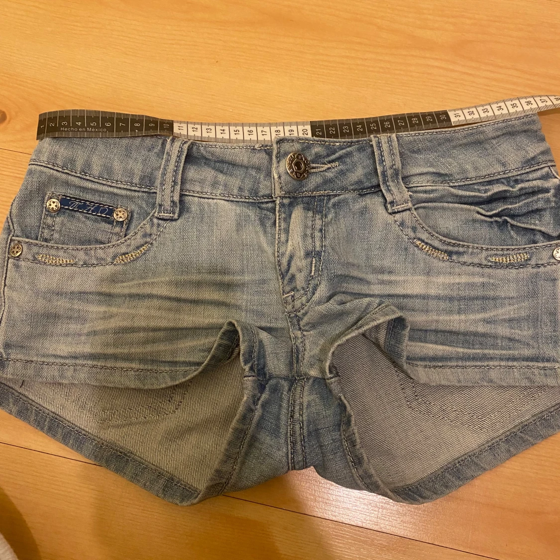 Blå jeansshorts lågmidjade korta - 92