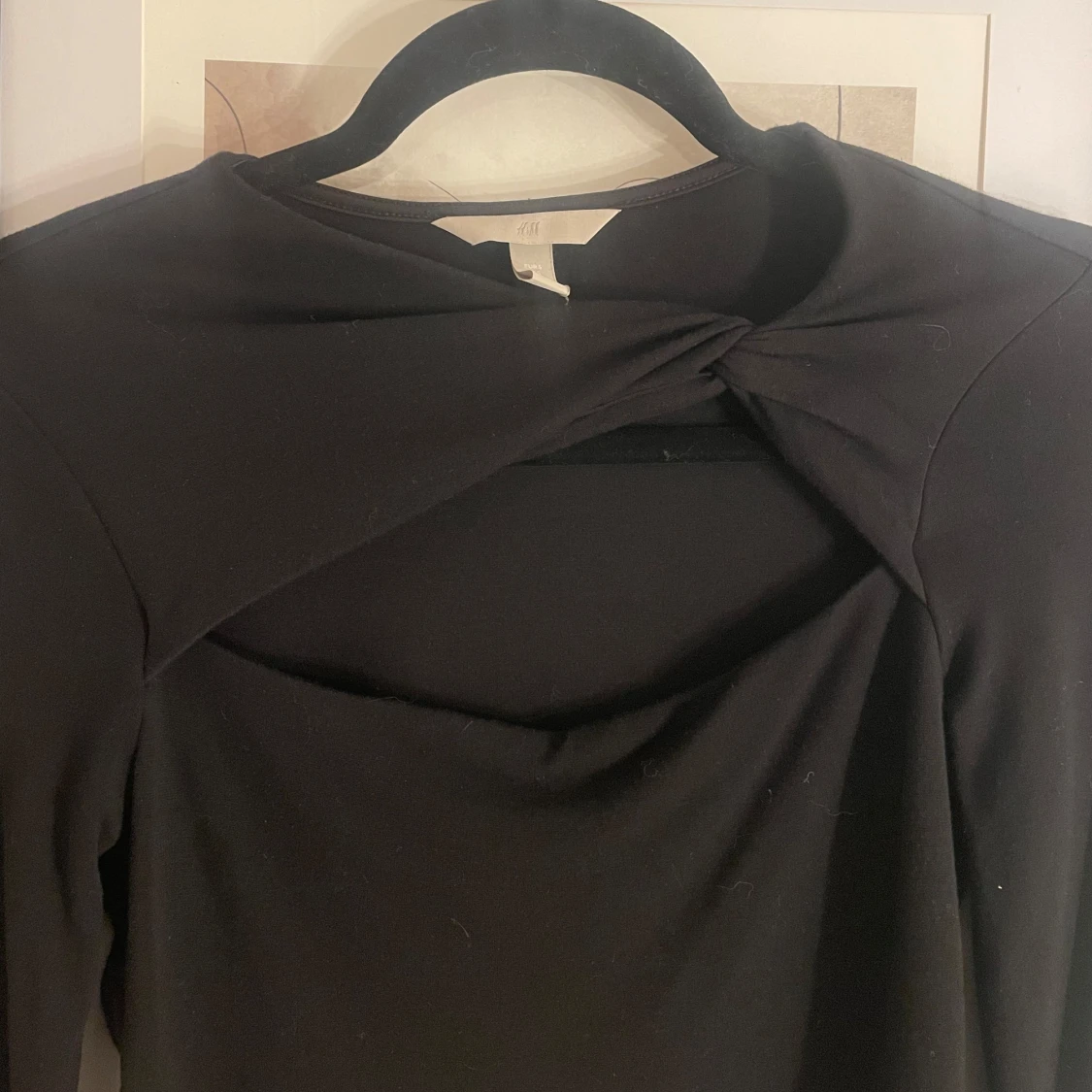 Svart långärmad topp med knutdetalj - 90