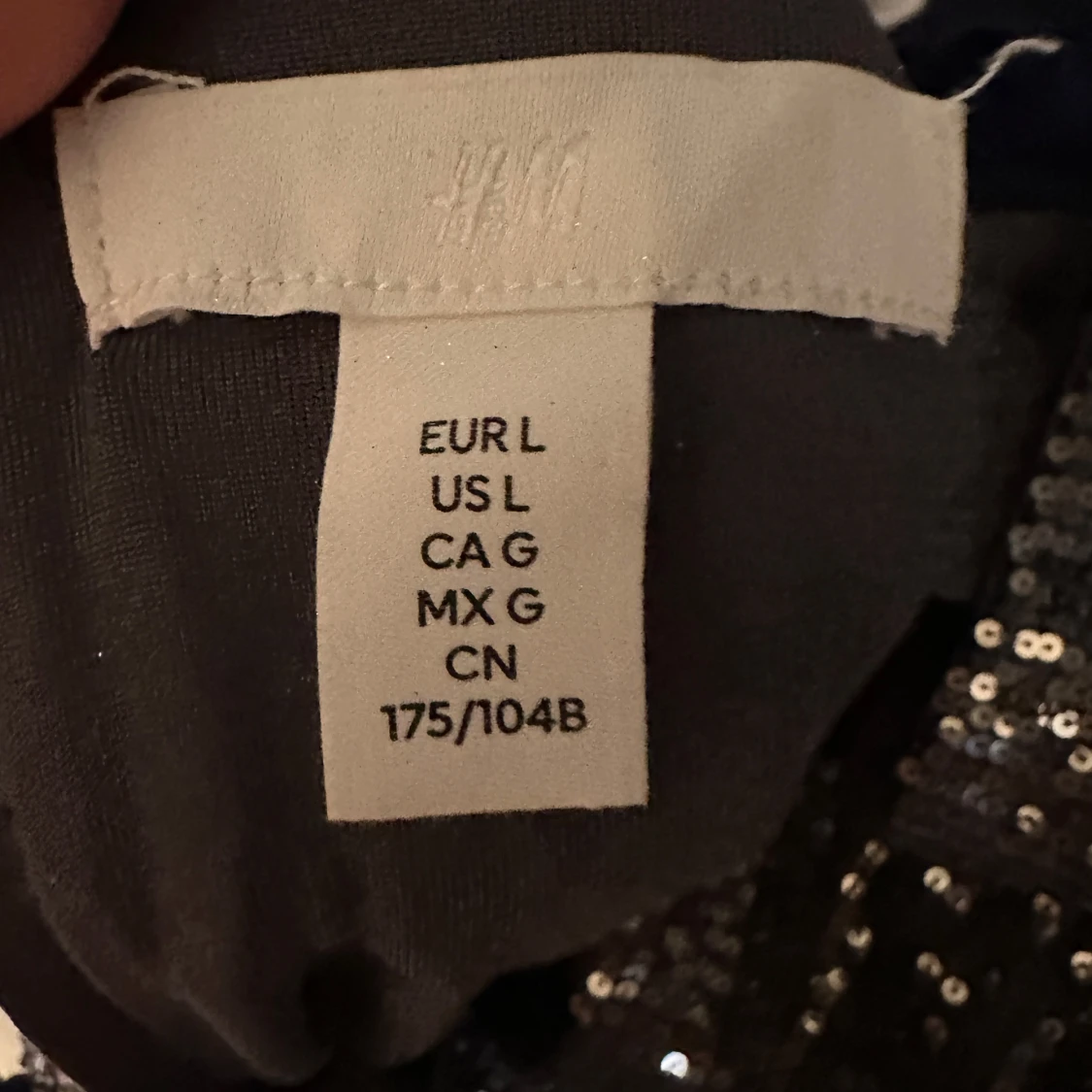 Glittrig topp från H&M - 90