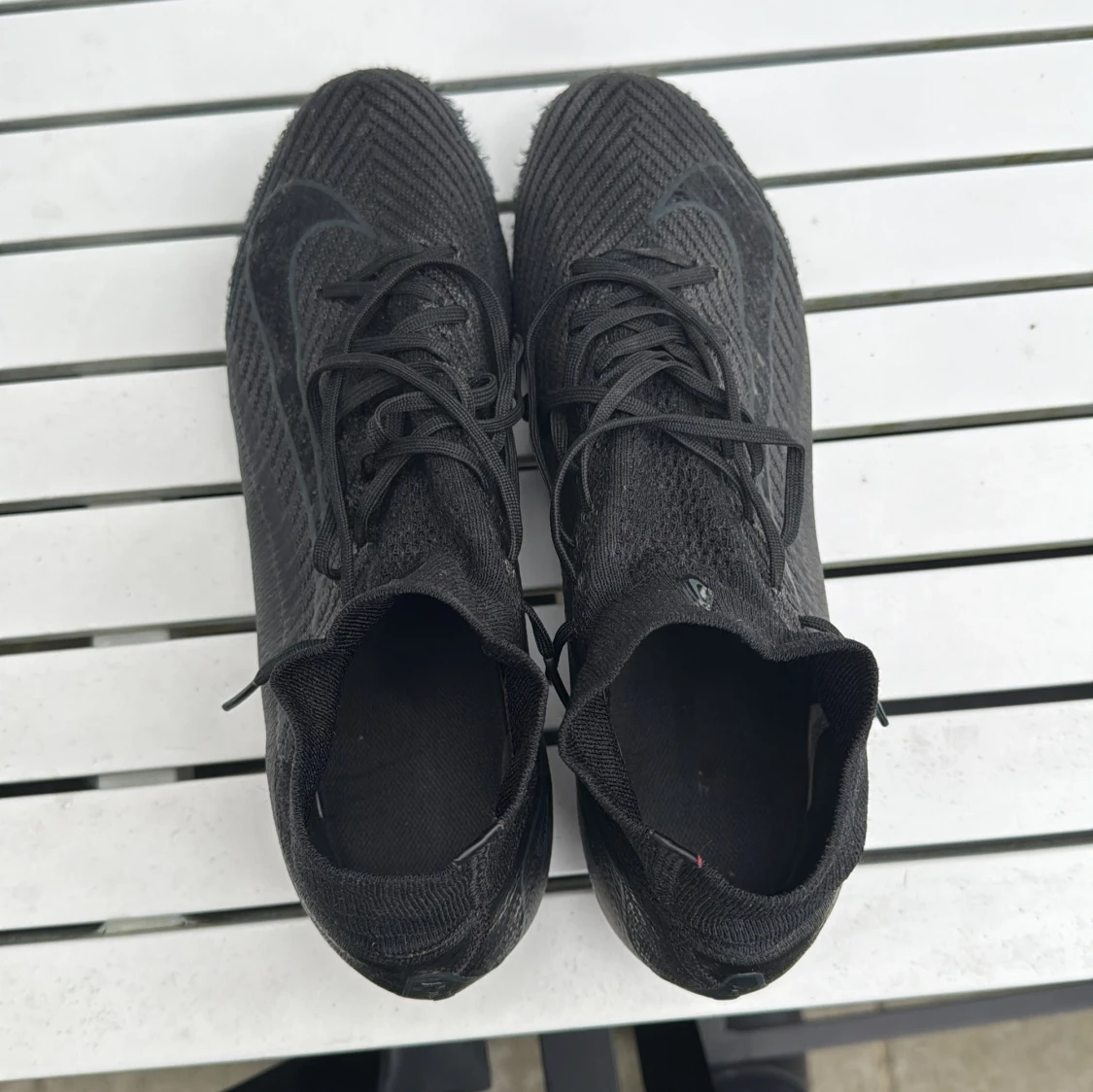 Svarta fotbollsskor från Nike