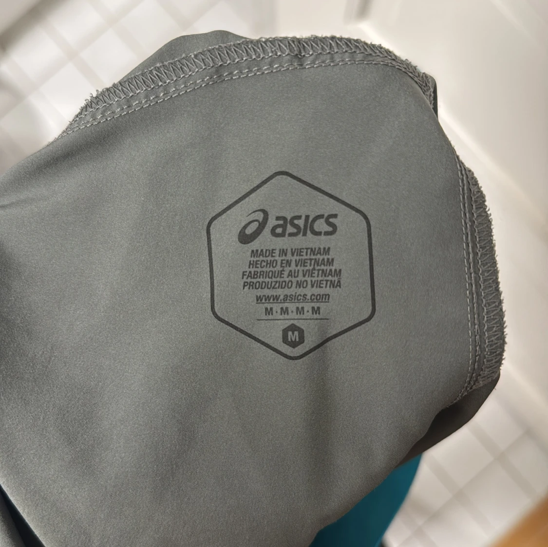 Grå träningsshorts från Asics - 2
