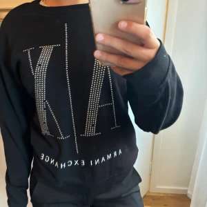 Armani exchange  - Armani college tröja i storlek XS