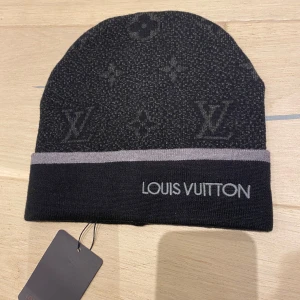 L-V mössa - Helt ny, aldrig använt