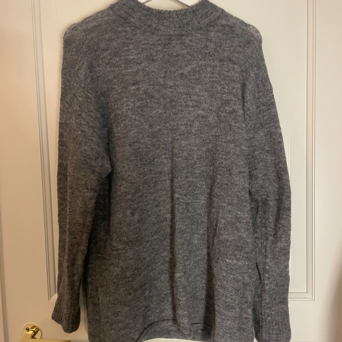 Oversized stickad - 91