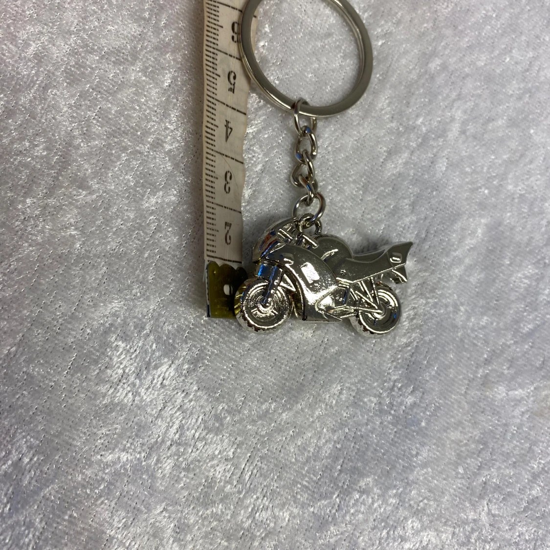 Nyckelringar med häst, motorcykel, fotboll och katt - 90